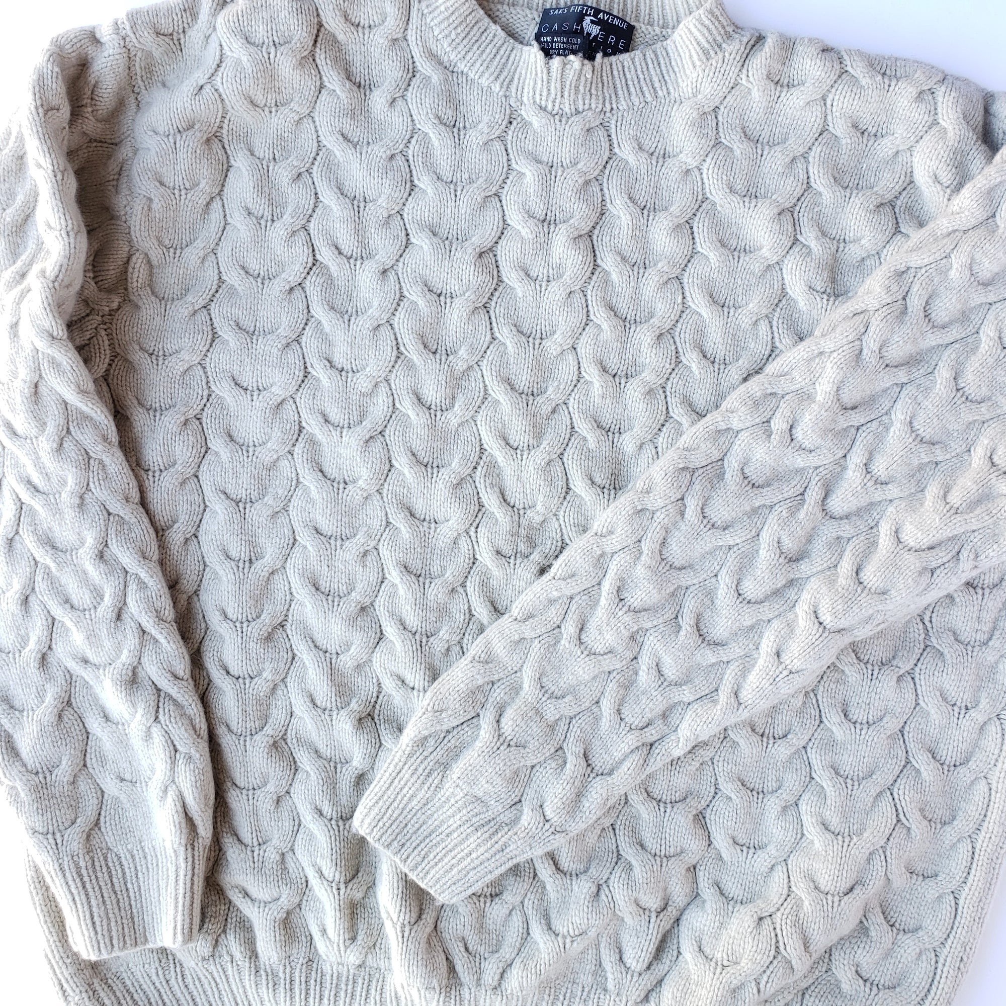 Cable knit sweater online pillow cover